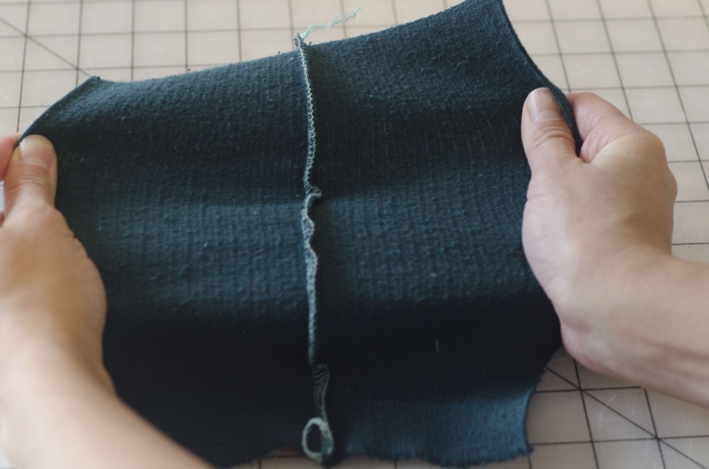 A serged seam is great for knits because it sews the fabric together and trims off the raw edges, reducing bulk and creating a strong, professional finish. You can pull and stretch these seams and they won't pop open.