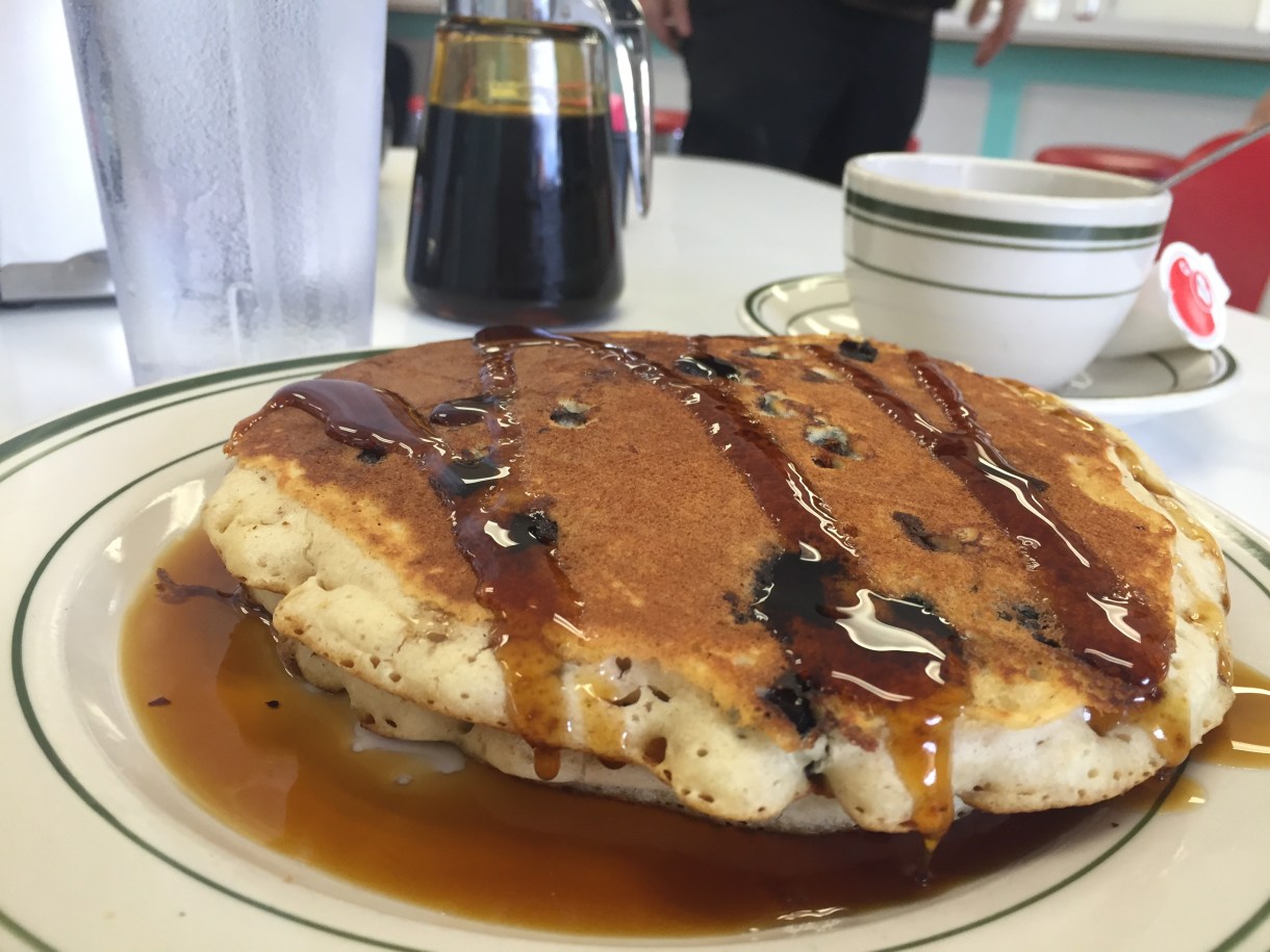 Louie's Cafe pancakes are stellar, but the locals swear by the Cajun hashbrowns, which bear a resemblance to what Yankees call "home fries." Photo by author.