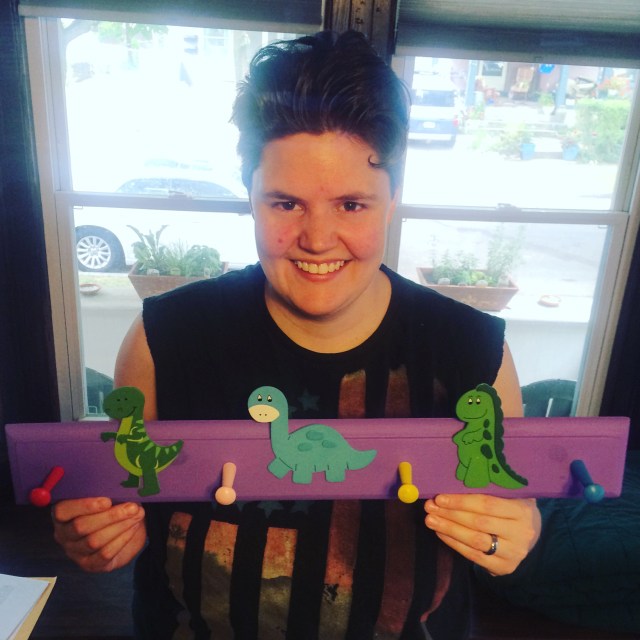 You can get this customized purple dino coat rack situation from ganderandgooseshop