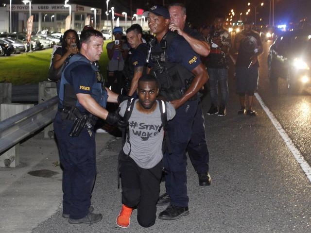 DeRay Mckesson being arrested by police in Louisiana as onlookers film with phones