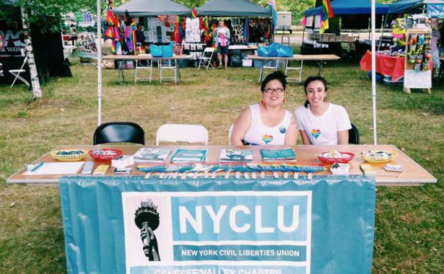 My coworker and me working hard or hardly working at Pride.