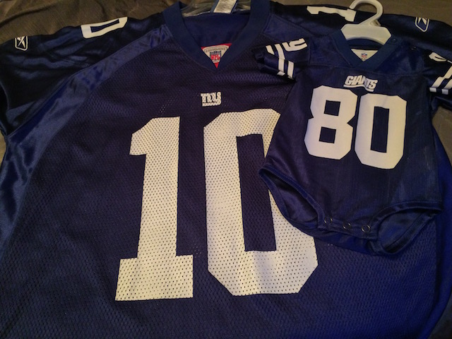 Matching Daddy Dino and Baby Dino official NFL jerseys (Eli Manning and Victor Cruz, respectively)