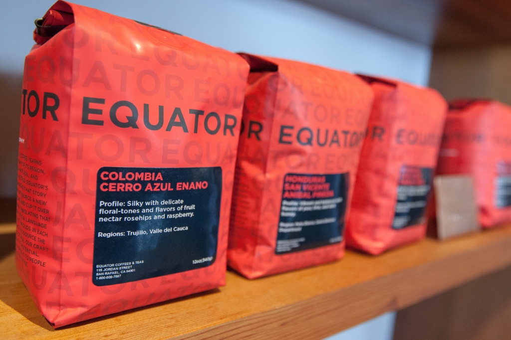 Coffee bags are seen on the shelves at Equator Coffee, Monday, Dec. 14, 2015, in Mill Valley, Calif. The roasters got into retail and are seeing huge growth.