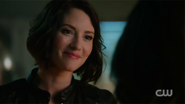 Alex forced a smile for Maggie.