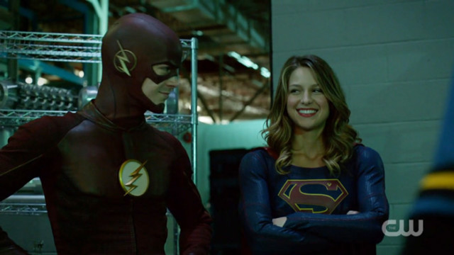 Flash and supergirl smiling