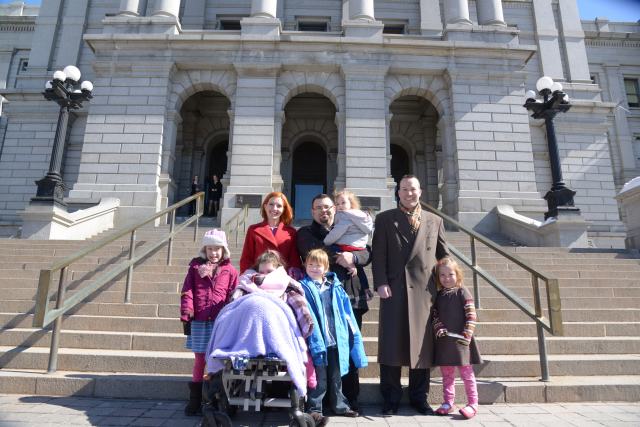 Coy Mathis and her family on the stairs of the courthouse.