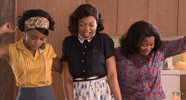 the three main characters from hidden figures smiling and laughing together