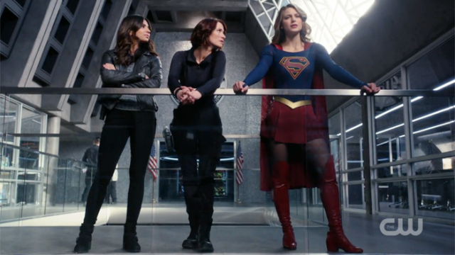 Maggie, Alex and Kara stand side by side by side.