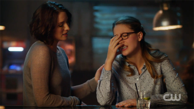 Kara cringes in embarrassment while Alex comforts her