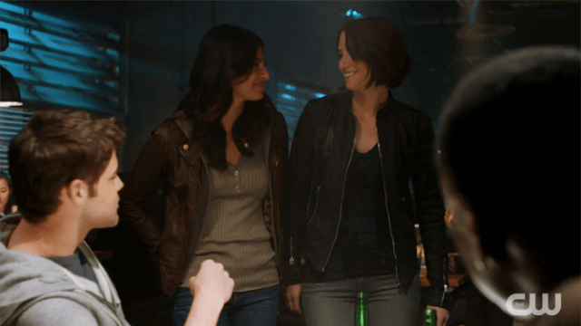 Maggie and Alex smile at each other