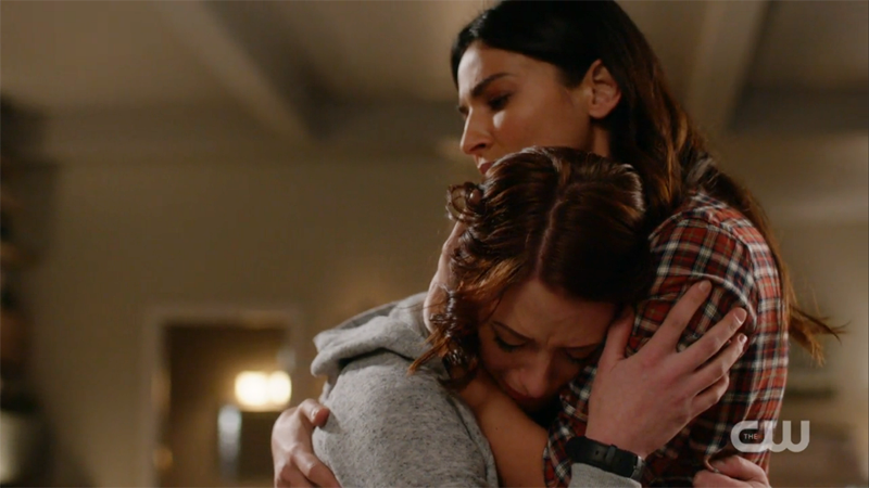 Maggie holds Alex while she cries