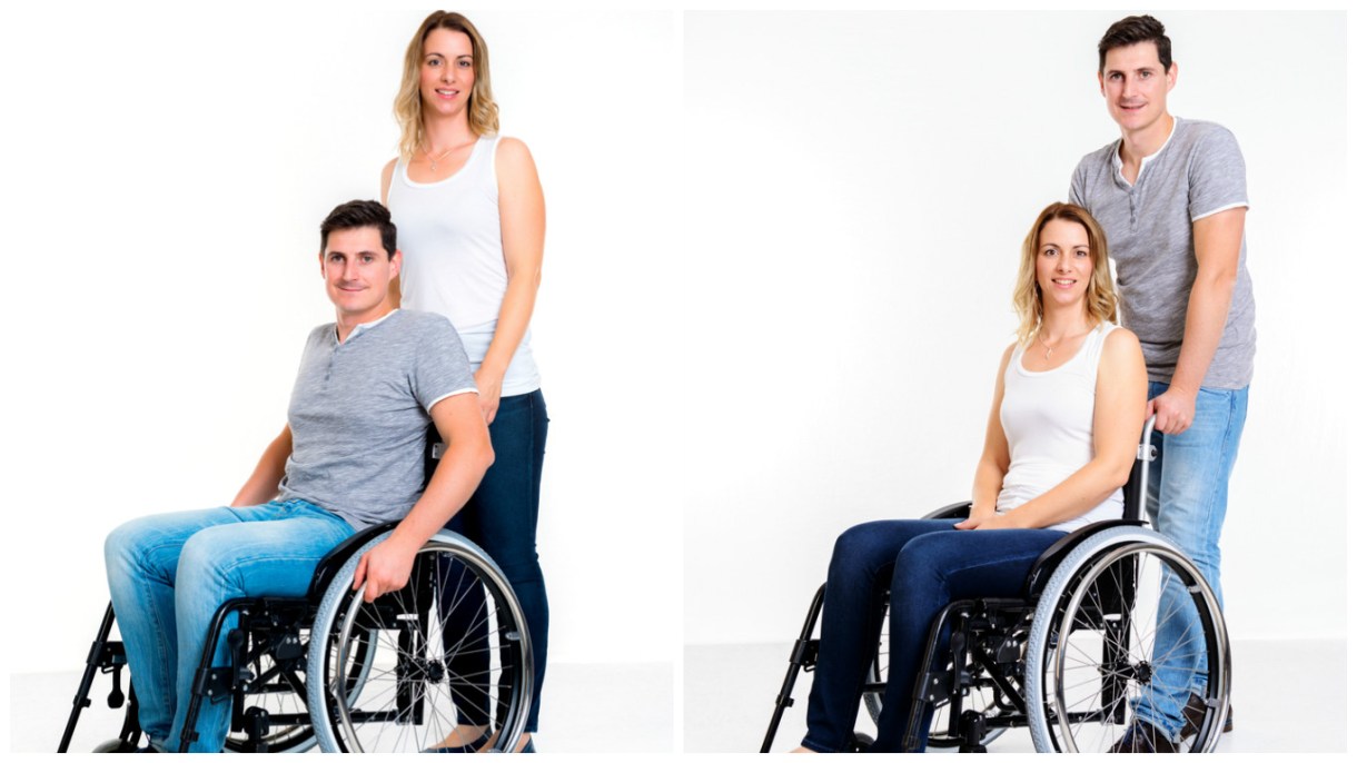 Two photos side by side. On the left, a white blonde woman is standing behind a brunette white man who's sitting in a manual wheelchair. Both are wearing blue jeans; she has a sleeveless white shirt on and he has a grey t-shirt. The right photo is of the same people with their positions switched; now he is standing and she is in the chair.