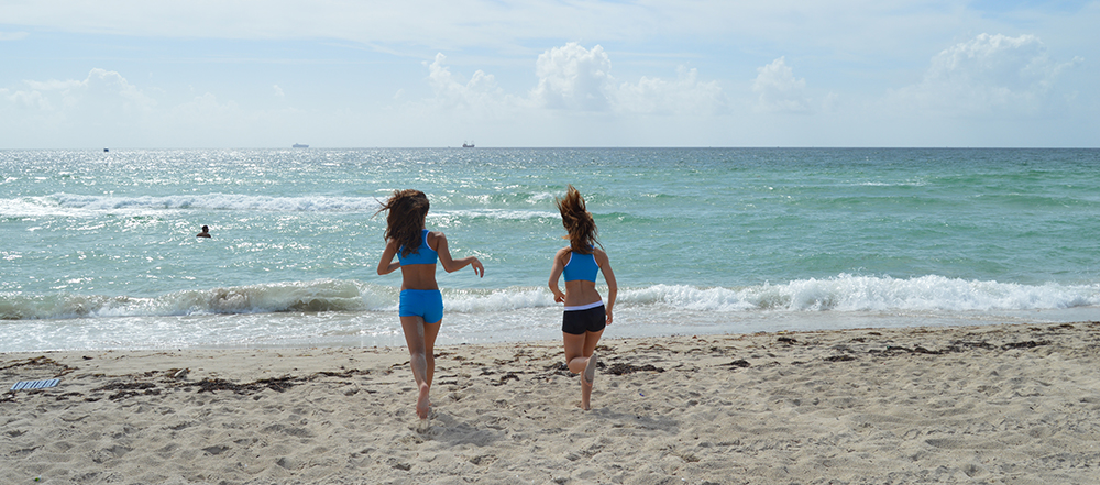 Outplay Swimwear – Shot of girls running into surf