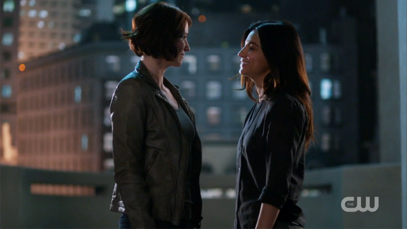Alex and Maggie look lovingly at one another