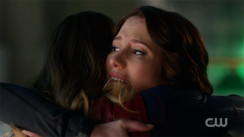Alex hugs Kara tight