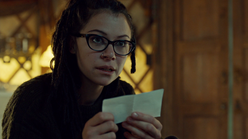 Cosima holds a wee piece of paper