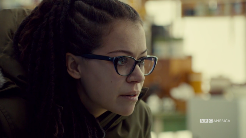 Cosima leans in to ask Chalrotte for help 