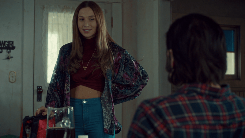 waverly stands with her hand on her hip and her belly exposed because purgatory