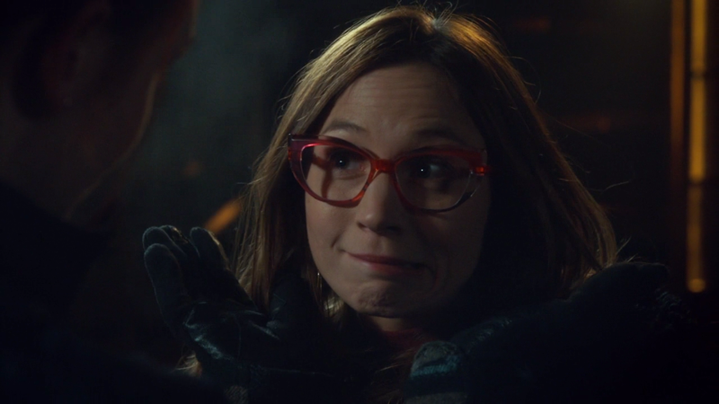 Waverly has on fake red glasses and is making an adorably dorky little smile 