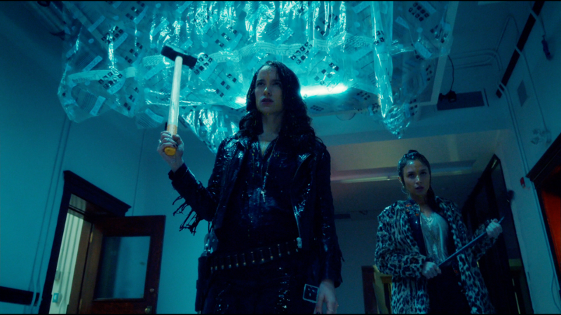 Wynonna and her sledgehammer and Waverly and her crow bar are covered in goo and swagging down the hall