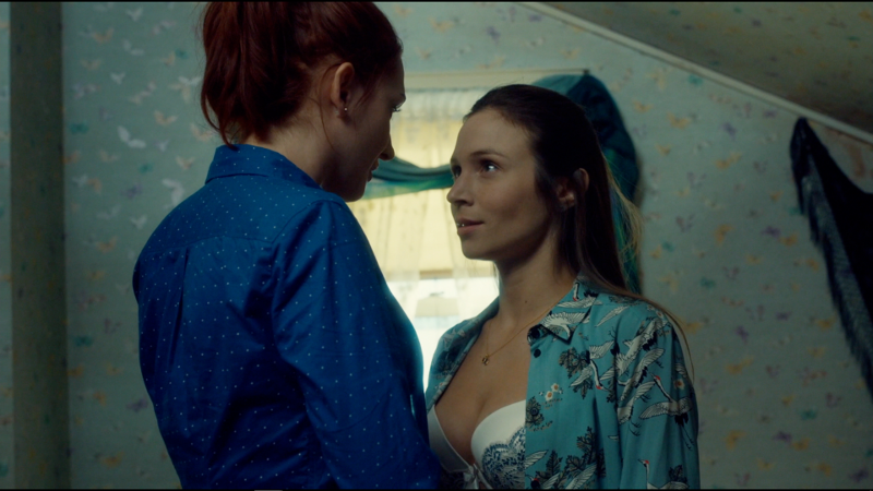 Waverly's shirt is open and she's saying yes yes yes with her words and her eyes