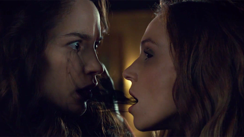 goo passes from waverly's eyes through her mouth into wynonna's mouth 