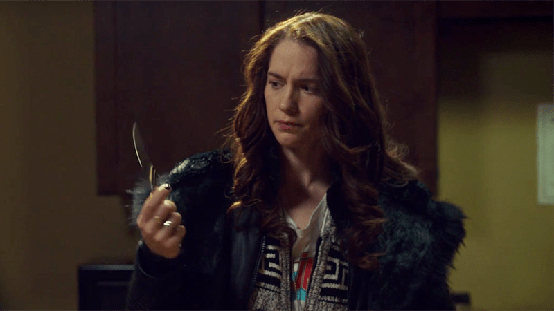 Wynonna looks at Waverly's stolen knife, perplexed