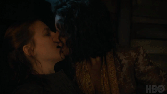 Ellaria is aggressively kissing Yara and it's not clear whether Yara is kissing back