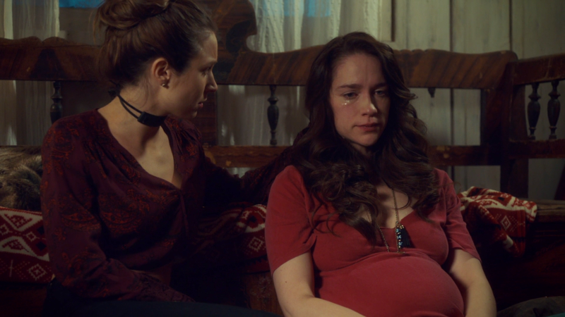 Wynonna cries and Waverly puts a comforting hand on her back