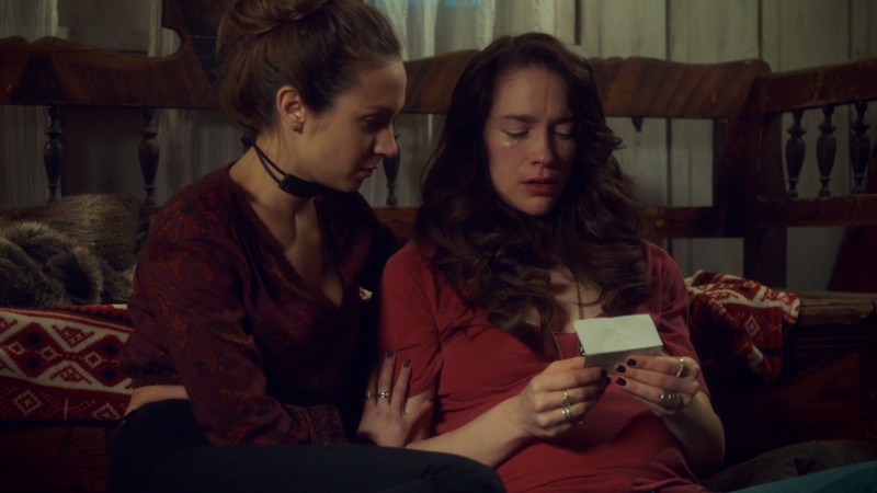 Waverly and Wynonna look at Doc's note