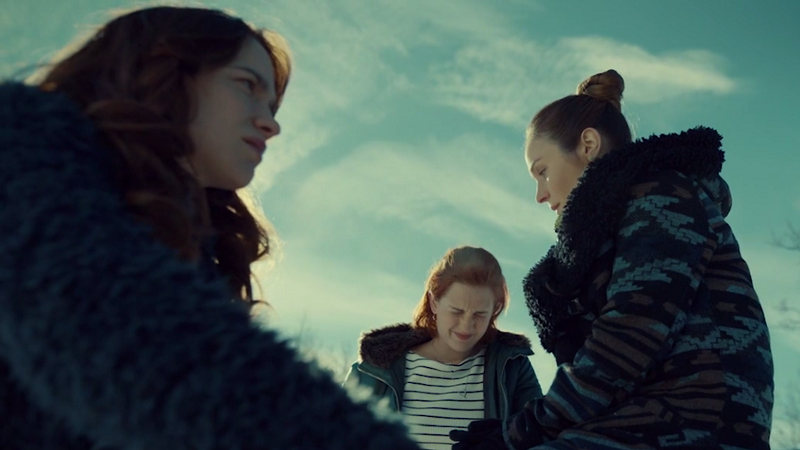 Wynonna and Waverly look thoughtful, Nicole looks hungover