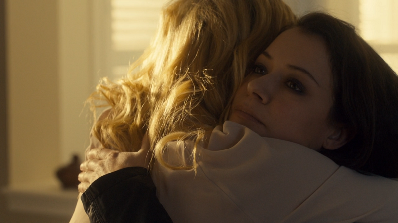 Delphine hugs Sarah