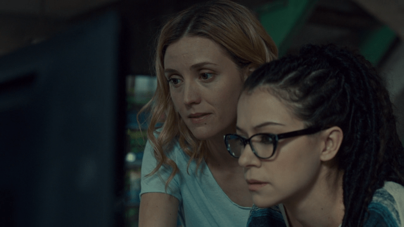 Delphine smiles and Cosima looks a little overwhelmed tbh