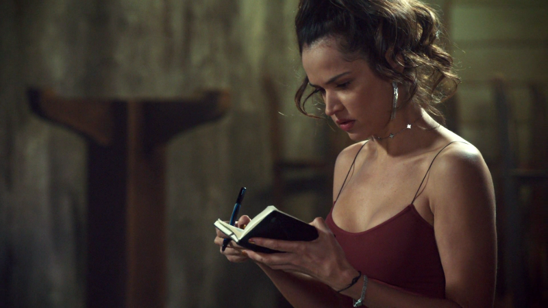 Rosita is looking in her little notebook