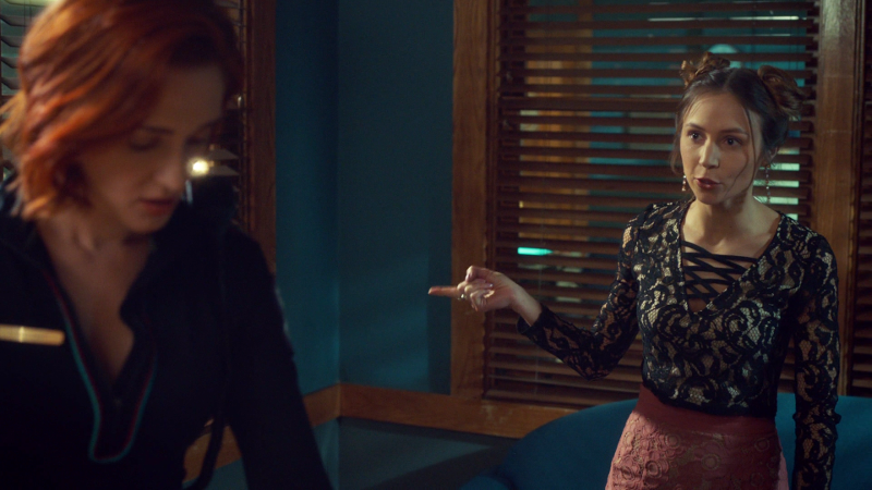 Waverly has a finger out, scolding Nicole