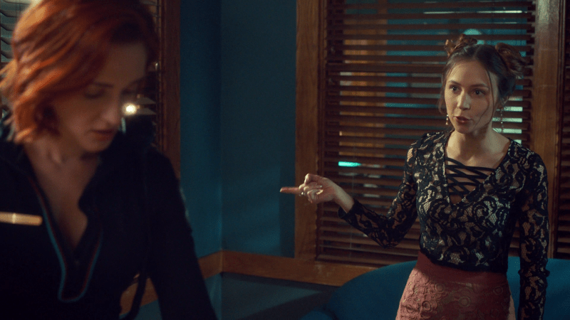 Waverly has a finger out, scolding Nicole