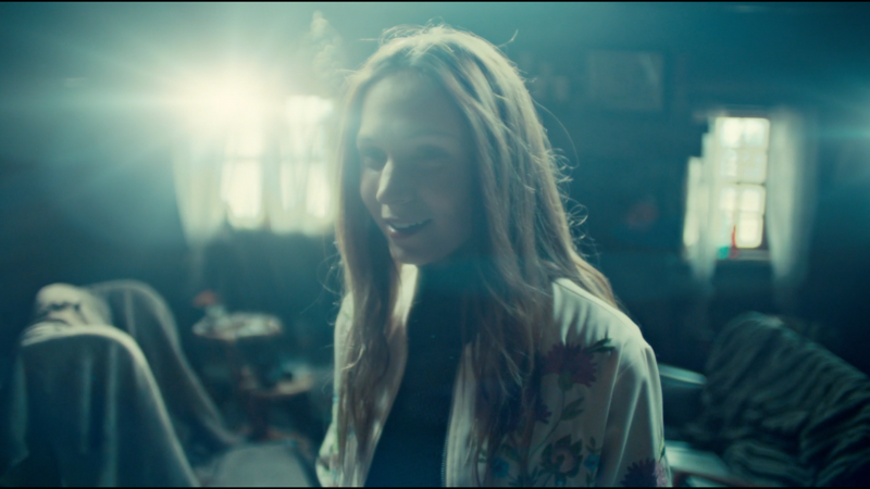 Waverly smiles fondly as she remembers Wynonna