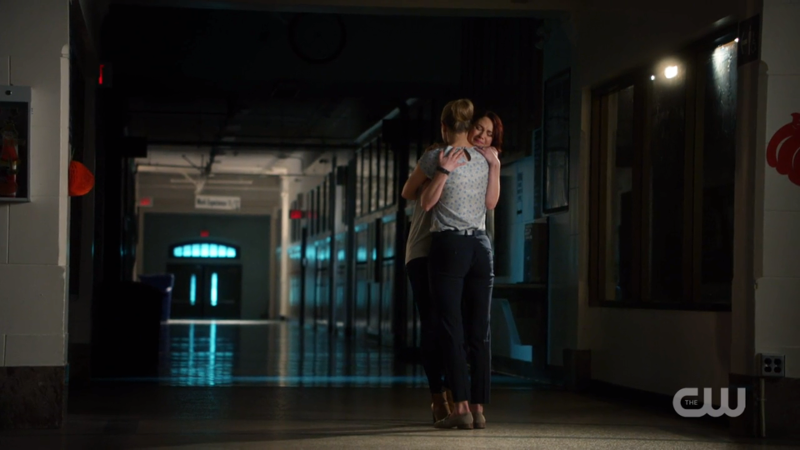 Kara hugs a devastated Alex