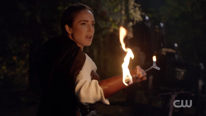Sara Lance catches a flaming arrow