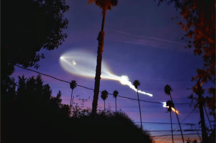 Photographer Erica Kelly Martin captured this amazing view of SpaceX's Falcon 9 rocket soaring over the palm trees of Hollywood, California after its launch from Vandenberg Air Force Base on Dec. 22, 2017. Credit: Erica Kelly Martin via Space.com.