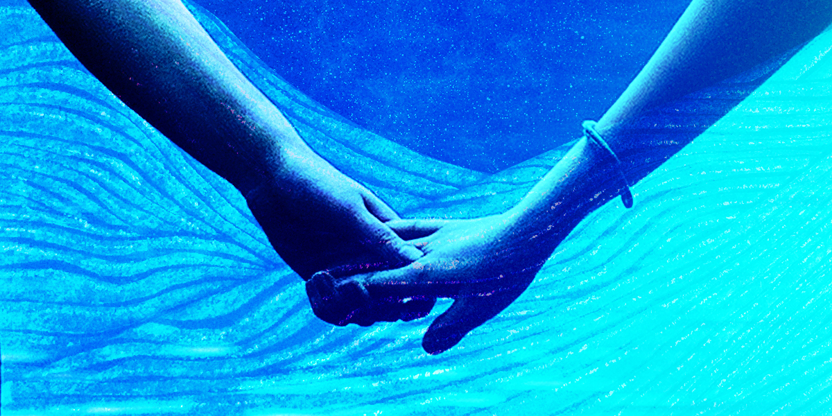 A graphic image of two women's arms holding hands against an ocean-like backdrop