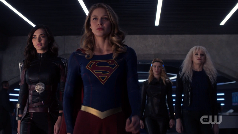 Kara, Imra, Psi and Livewire powerwalk out of the DEO