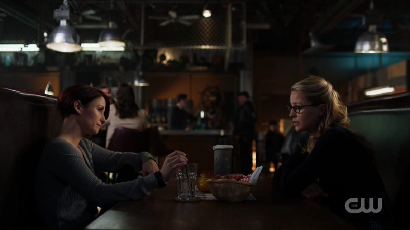 Alex and Kara sit across from each other