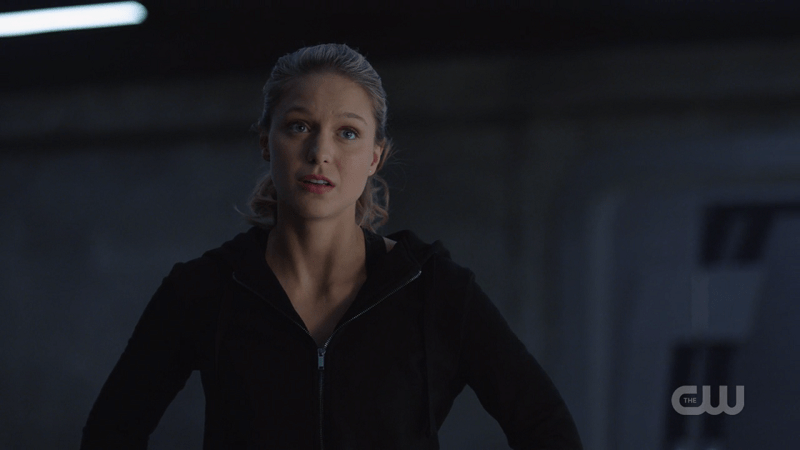 Kara looks concerned but all I can see is her DEO tracksuit