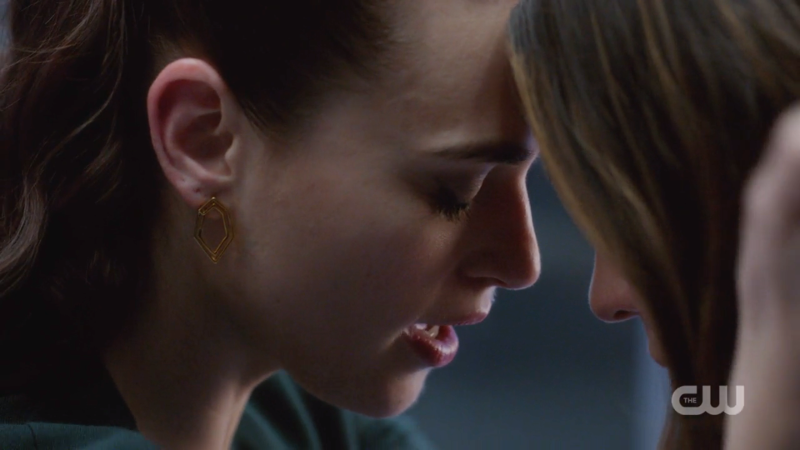 Lena and Sam press their foreheads together