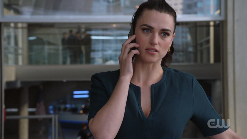 Lena is on the phone and looks good doing it 