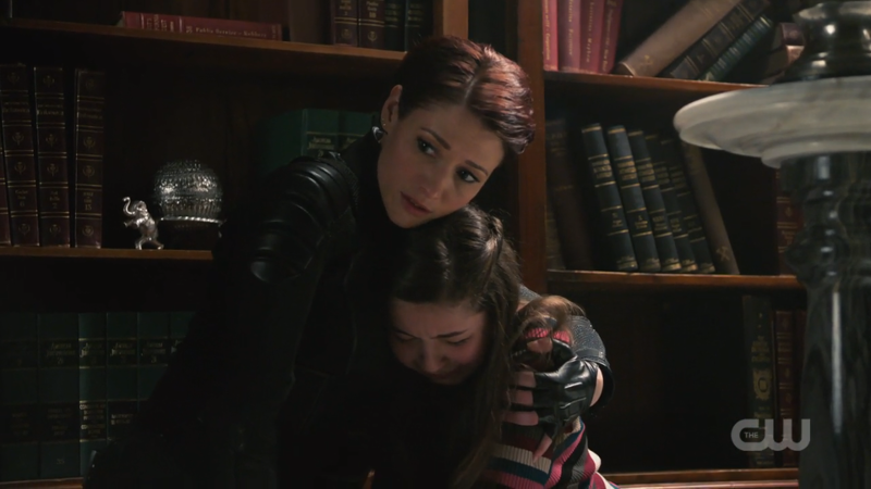 Alex holds Ruby as she cries