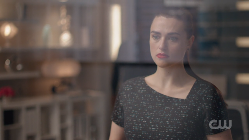 Lena looks wistfully out her window