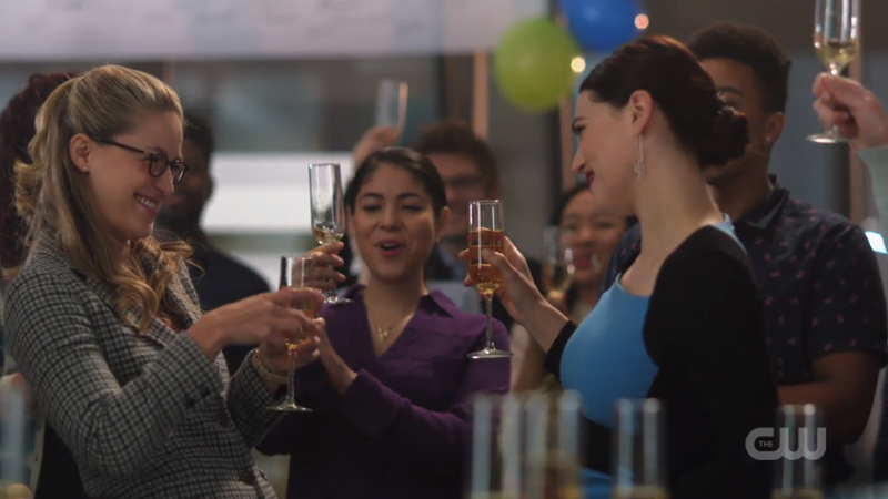 Kara and Lena toast to Kara's mysterious disappearance 