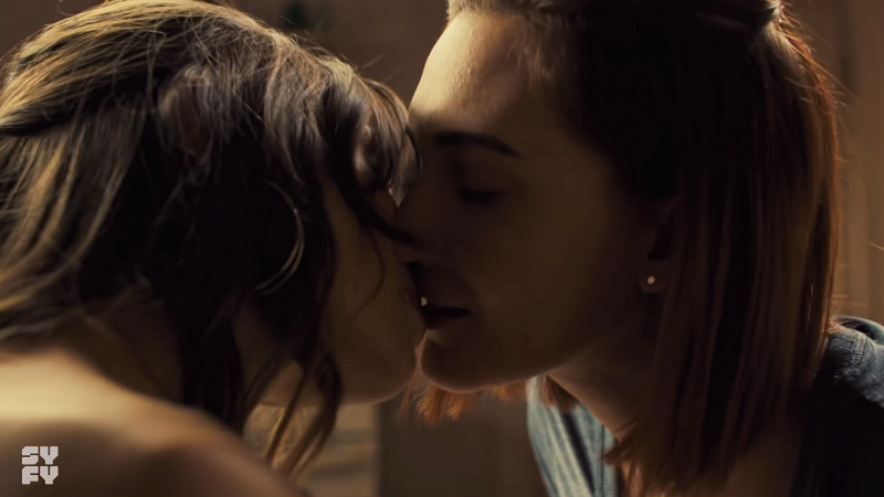 Waverly and Nicole kiss and Waverly has bangs